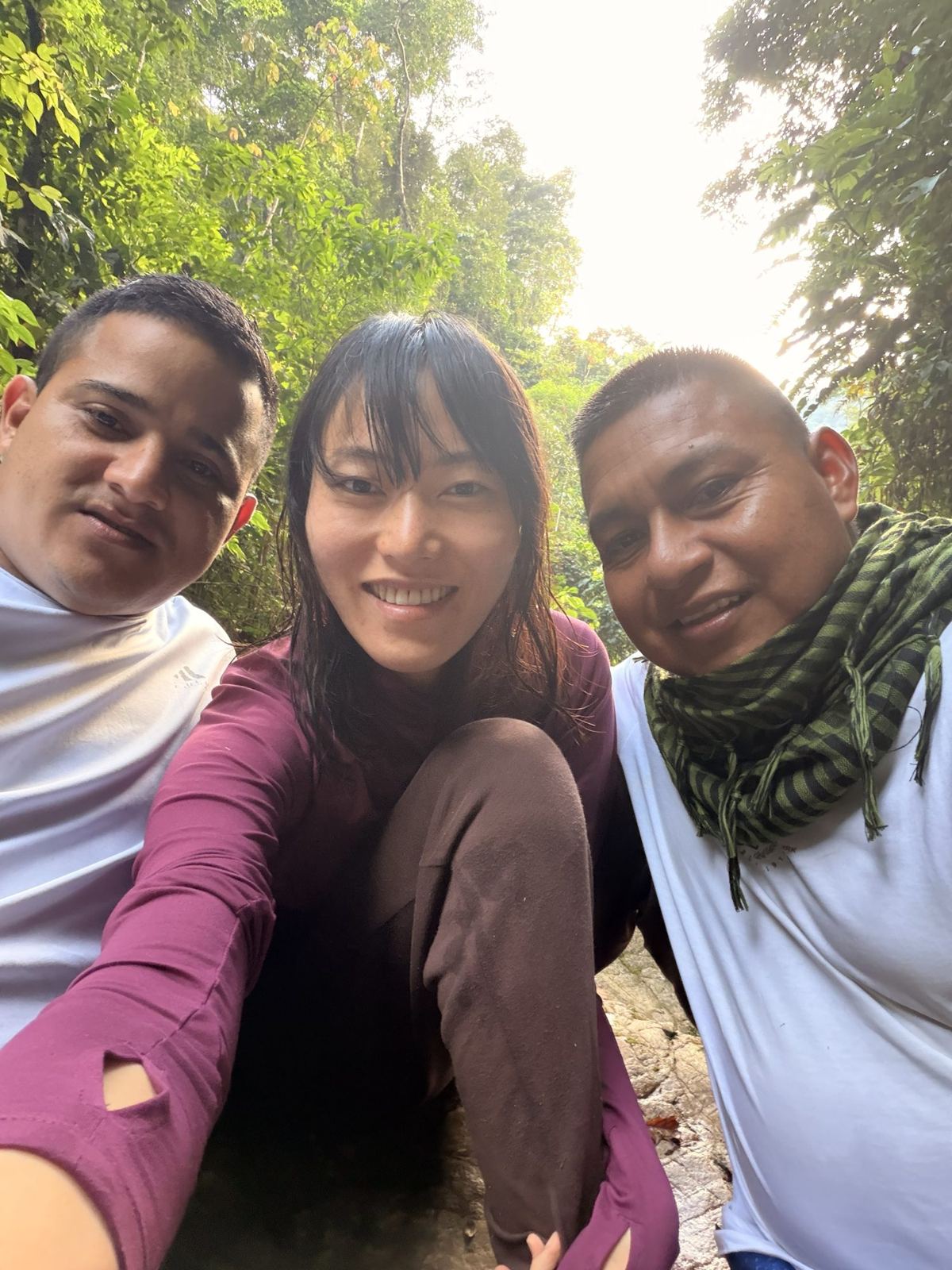 Min with two members of Taita Miguel's family